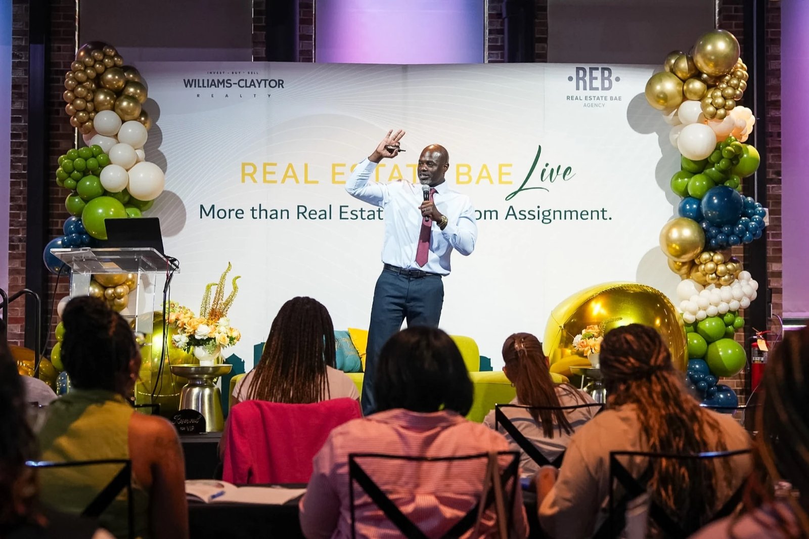 John Lewis teaching on stage at Real Estate Bae Live